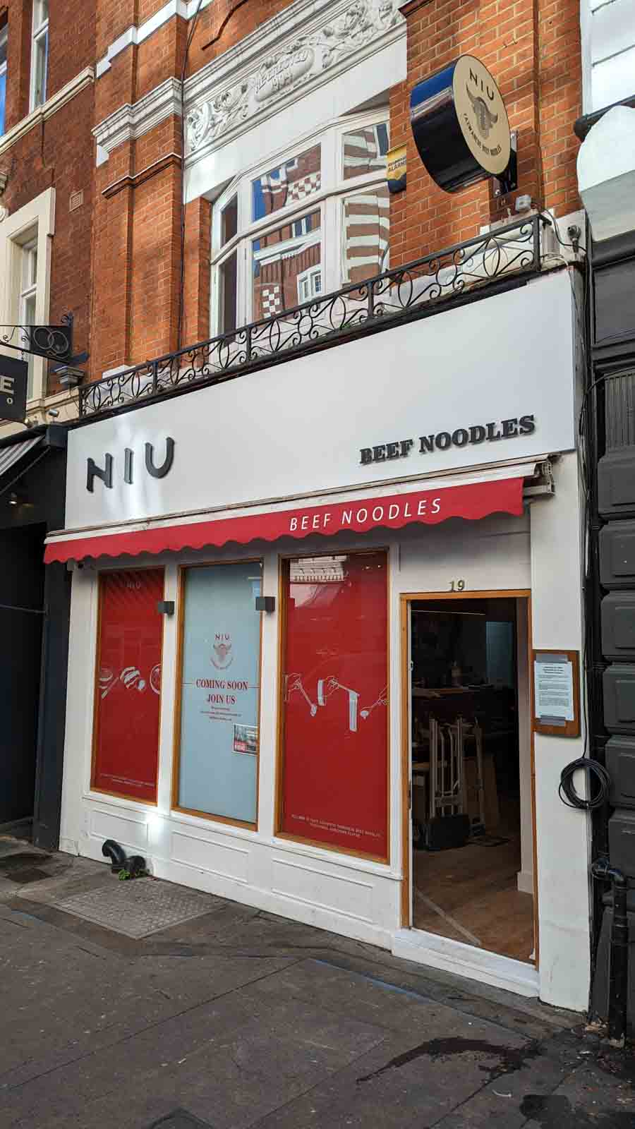 WHITE ALUMINIUM COMPOSITE SIGN TRAY WITH 10MM MATT BLACK ACRYLIC LETTERS APPLIED DIRECTLY TO FACE