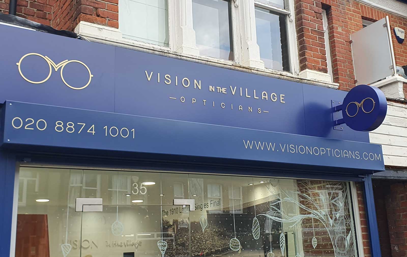 POWDER COATED ALUMINIUM CIRCULAR PROJECTING SIGN WITH GOLD WET COATED ACRYLIC LETTERS